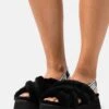 Ugg Disco Cross Slide - Pantoffels - Black -Verfijnd Schoen Winkel 42ed0fa8931e44ce8edf31223c44e6b1